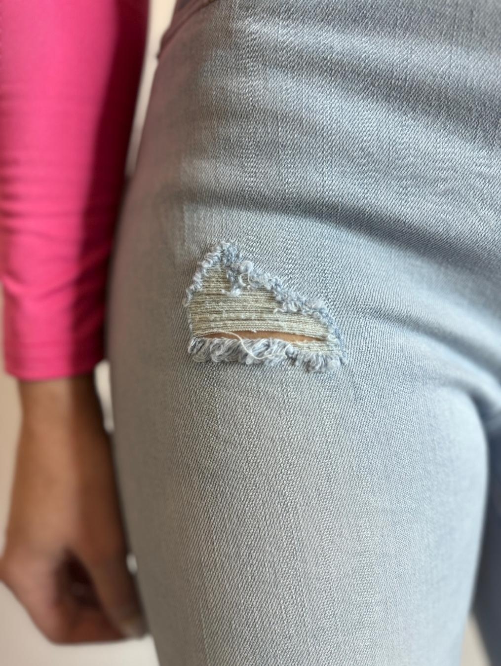 Jasne jeansy z dziurami LX156