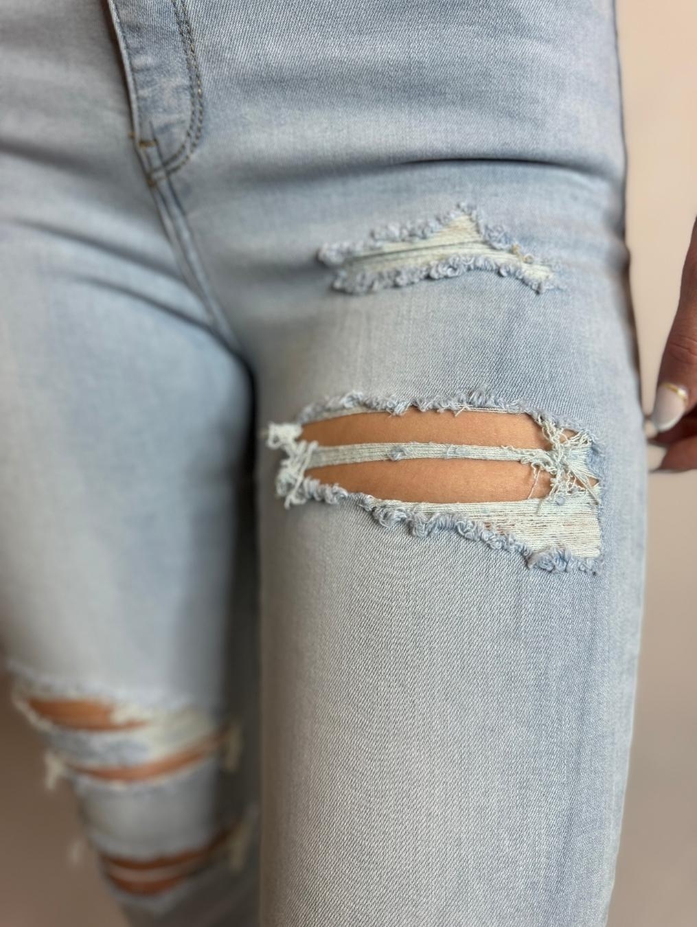 Jasne jeansy z dziurami LX156