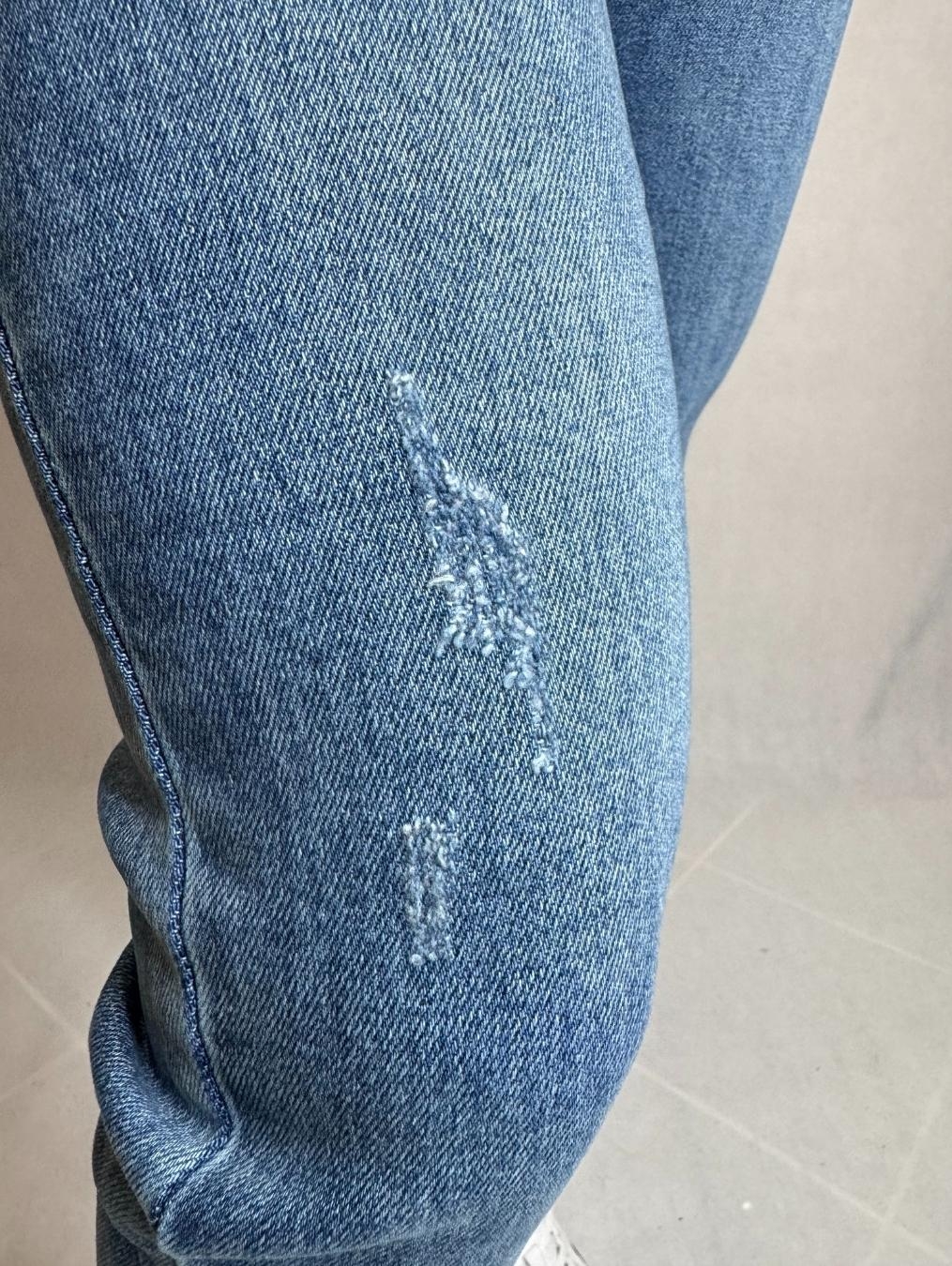 Jeansy regular fit z przetarciami LX158