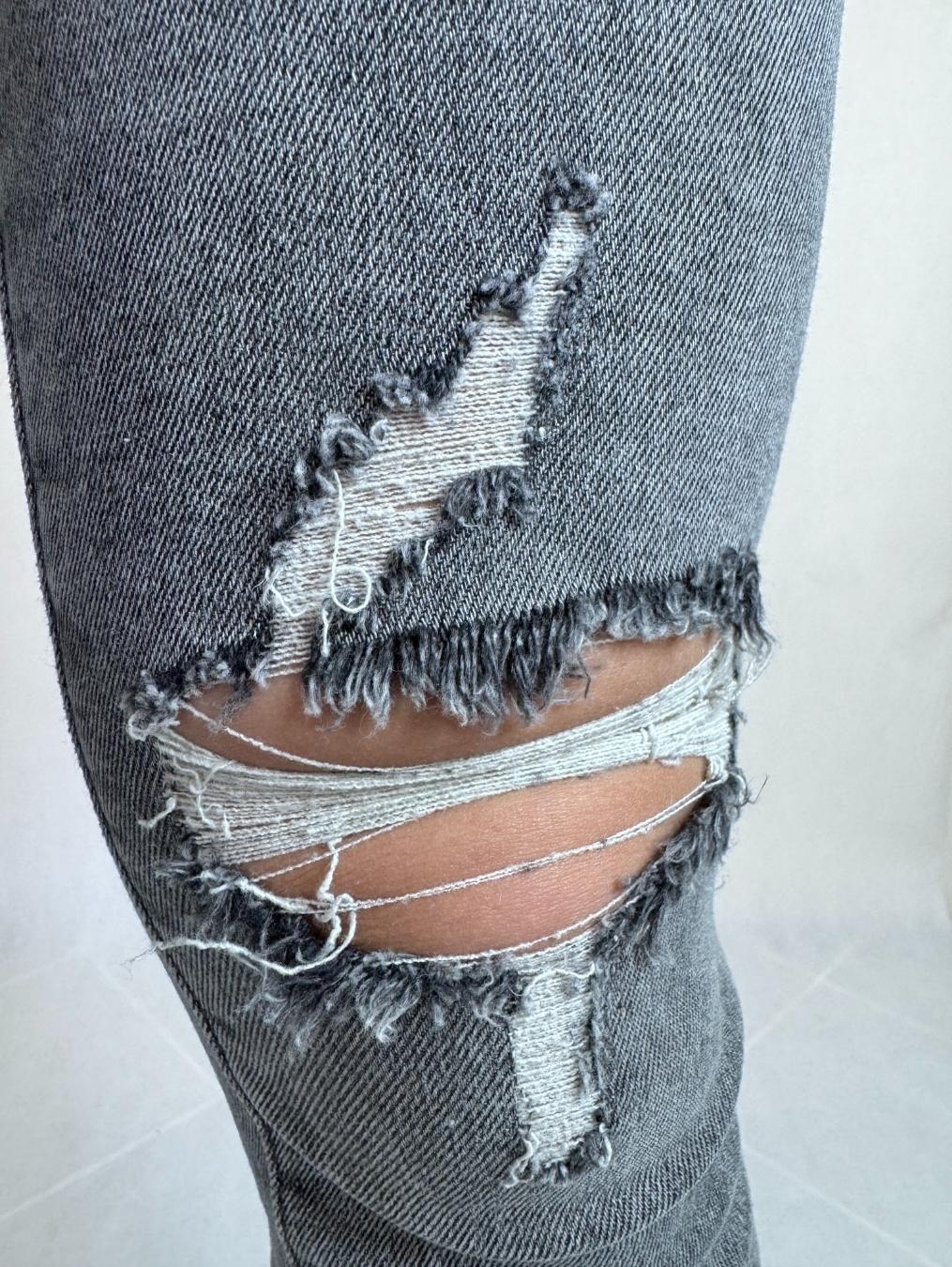 Modne jeansy z dziurami LX122