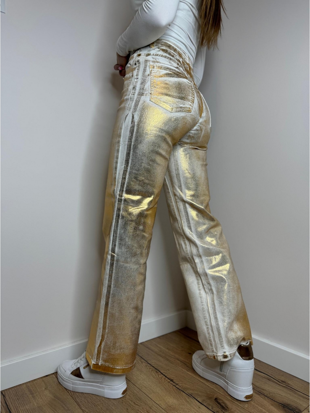 Złote spodnie z rozszerzaną nogawką LX145-Z